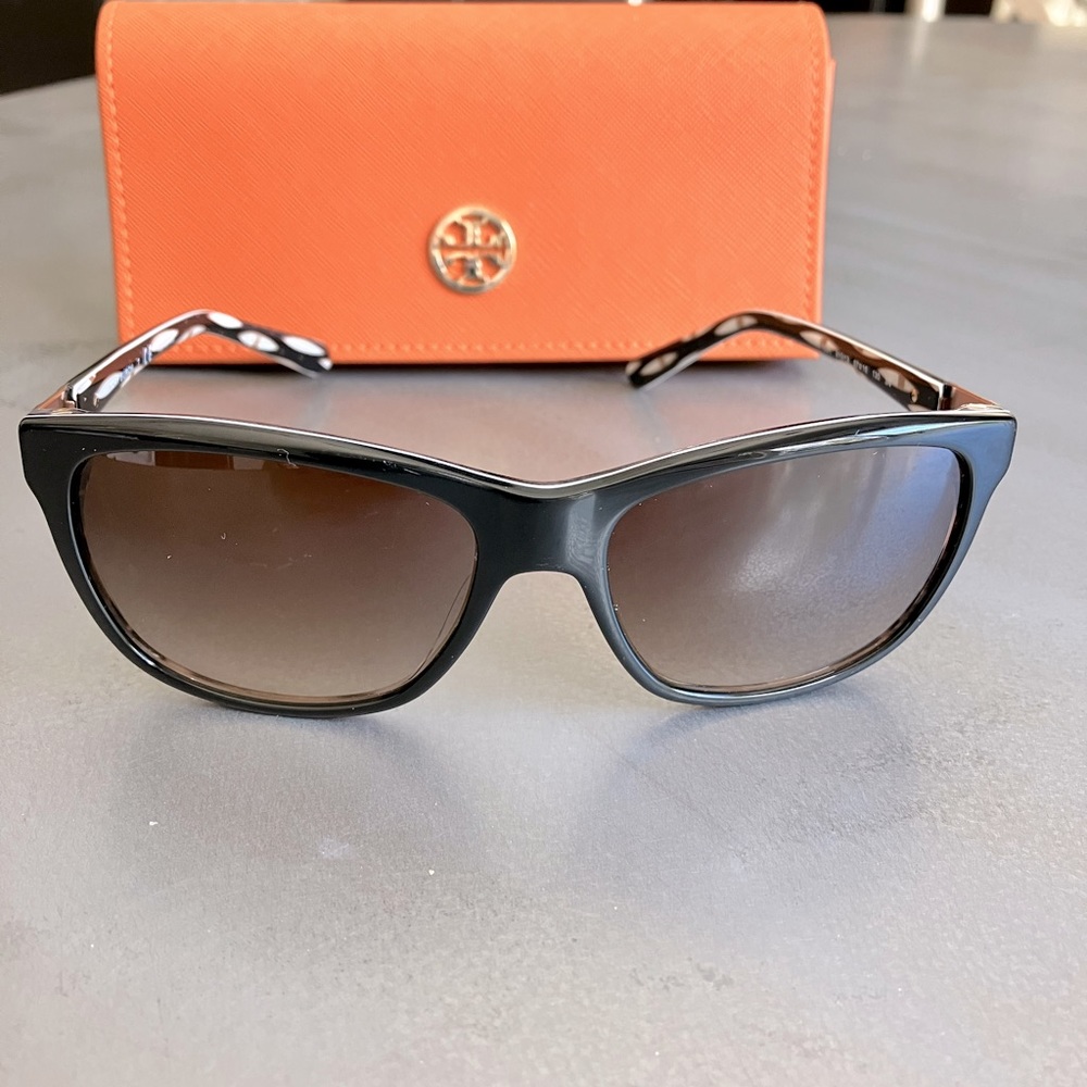 Tory Burch authentic womens black fashion sunglasses with carrying case.